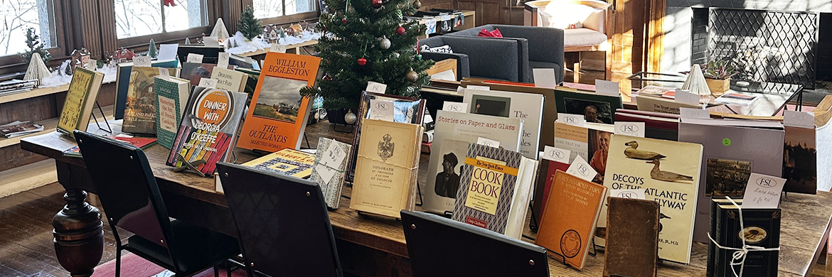 Books displayed on a desk during a Friends Book Sale