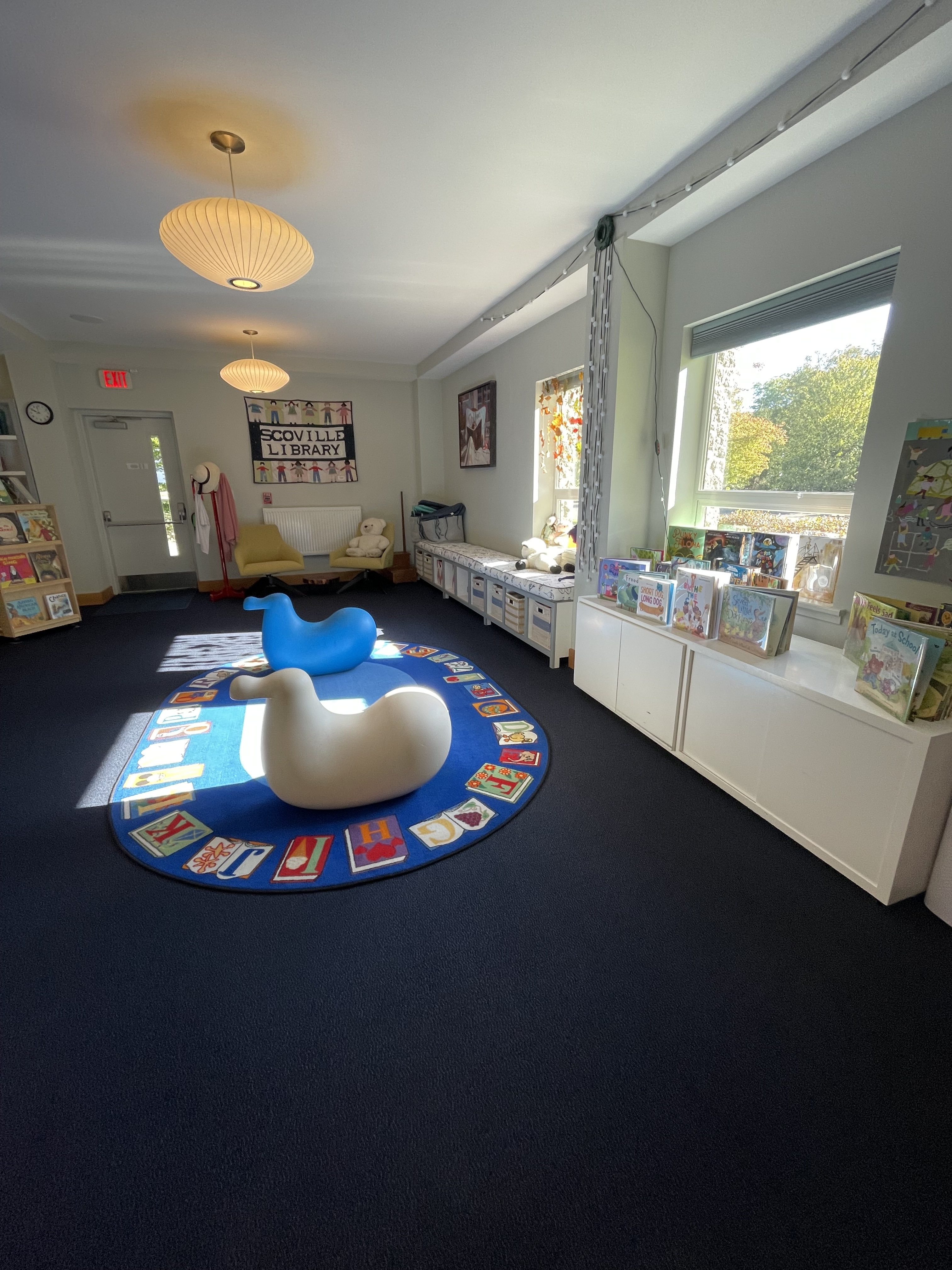 Storytime rug with duck toys