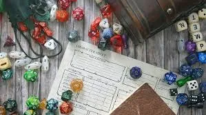 game dice and worksheets scattered across tabletop